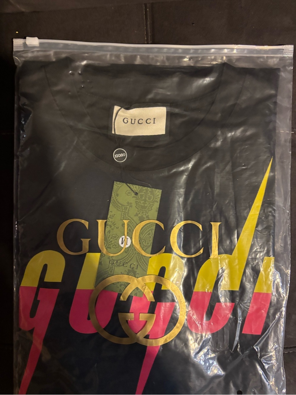 Gucci Men’s Black Short Sleeve Logo Tee with Gold & Pink Accents